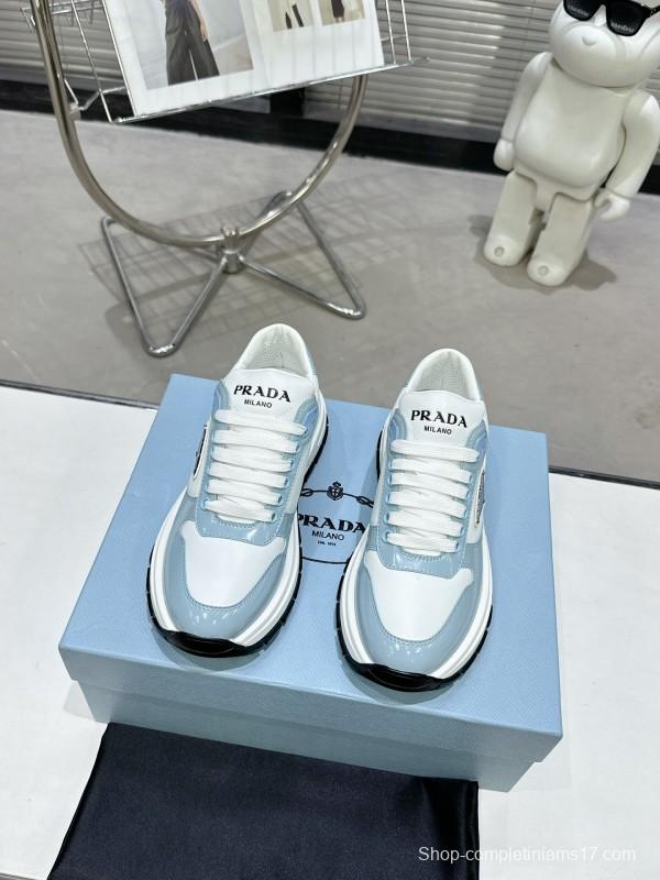 2025 Women Prada Light Blue White Leather Sneakers KFY00310