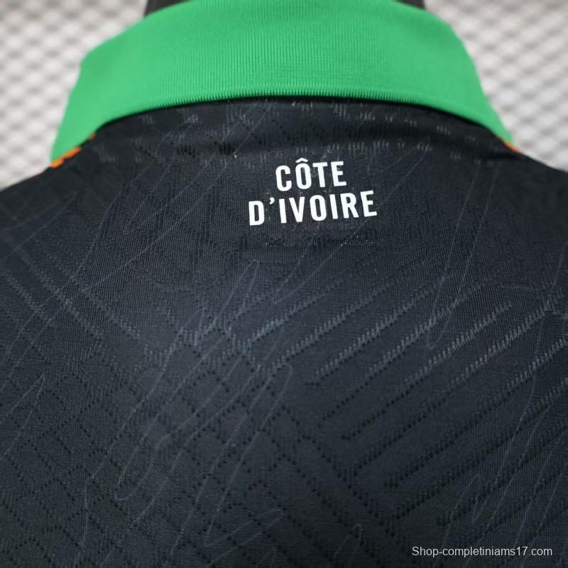 Player Version 2025 Ivory Coast Black with Elephant Graphic and Orange Stripes Jersey